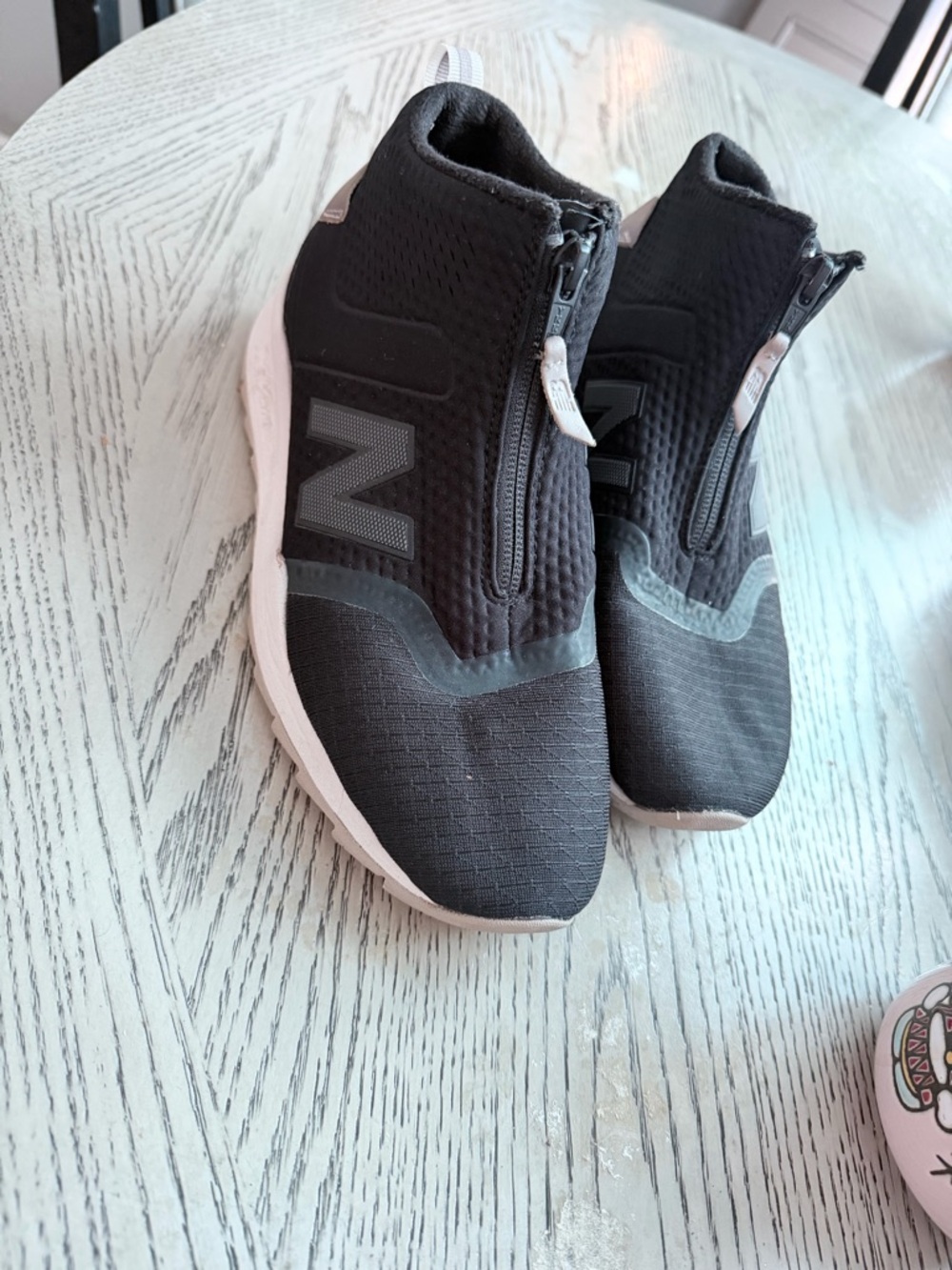 New Balance Black and White Zip Slip-On Sneakers